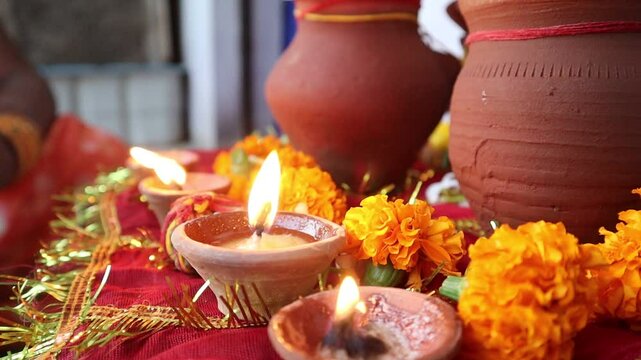 Traditional Karwa Chauth rituals, featuring Karwa Sthapana, diya lighting, and Chhat Pooja elements, symbolizing devotion, culture, and celebration of love and prosperity in Indian festivals