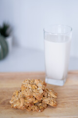 Close-up homemade baked tasty crunchy cookies biscuit sweet delicious snack dessert on table with milk oat milk almond for healthy lifestyle simple morning breakfast dairy product meal refreshment