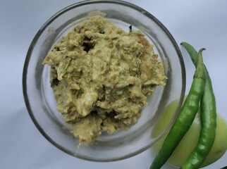Green tomato chutney or raw tomato chutney, Indian dip or sauce, tangy and spicy Maharashtra, Karnataka and Andhra style chutney made from raw tomatoes