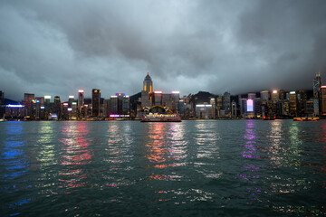 Fototapeta premium Hong Kong downtown skyline across Victoria harbor at night, Hong Kong, China.