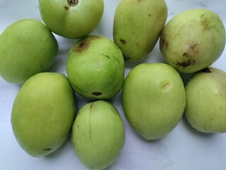 Organic raw tomatoes. Green unripe tomatoes.