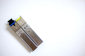 optical transceiver modules on a plain background