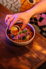 Delicious noodles with beef, close-up shot.