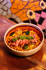 Delicious noodles with beef, close-up shot.