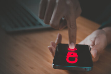 Data Security system concept, Business man is logging into system by mobile phone and  touch security icon, innovation technology, cloud computing, internet network communication