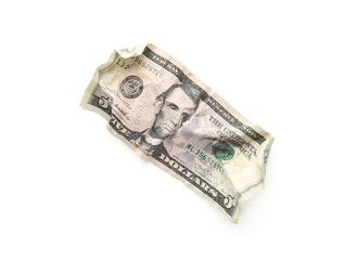 One crumpled dollar banknote isolated on white, top view