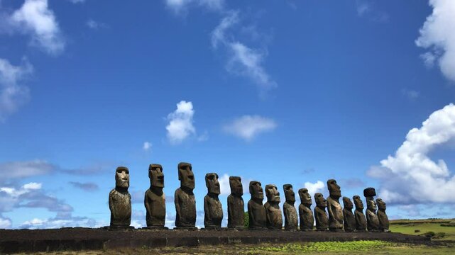 A beautiful sunny landscape from Ahu Tongariki Moai in a summer day in Easter Island, Rapa Nui, Polynesia, Chile, Latin America. Video with copy space.