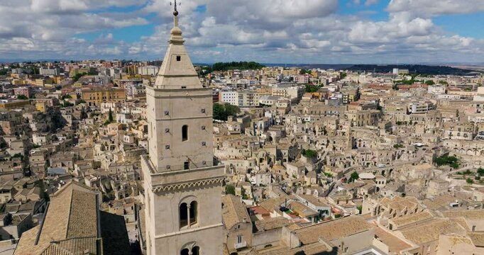 View of Cathedral of Sassi Di Matera Bell Tower In Basilicata, Italy. Aerial Drone Shot