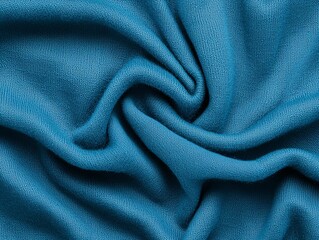 Captivating close-up of textured teal fabric showcasing luxurious softness and elegance perfect for fashion and interior design applications