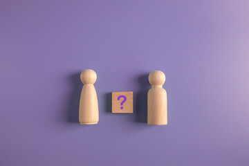unknown relationship and love unlove concept.wooden couple with unknown status question mark icon...