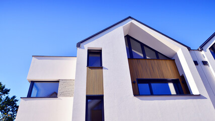 Residential homes with modern facade.Terraced family homes in newly developed housing estate. The...