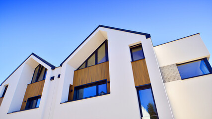 Residential homes with modern facade.Terraced family homes in newly developed housing estate. The...