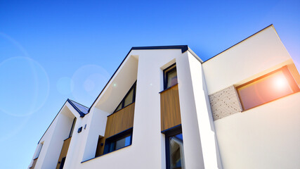 Residential homes with modern facade.Terraced family homes in newly developed housing estate. The...