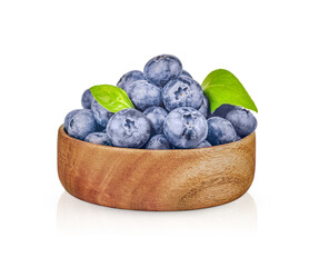 ripe blueberries in a bowl isolated on white background