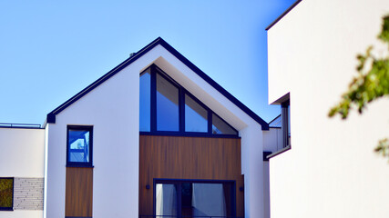 Residential homes with modern facade.Terraced family homes in newly developed housing estate. The...