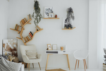 Cozy living room with unique bookshelf and plant decor in a modern home setting