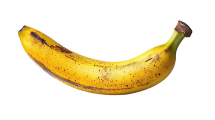 Lone banana resting on a white surface revealing its vibrant yellow exterior and brown speckles