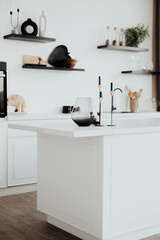 Modern kitchen with minimalistic decor and elegant design elements in daylight