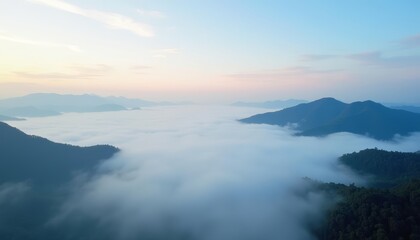 Fototapeta premium Majestic mountain peaks shrouded in ethereal mist