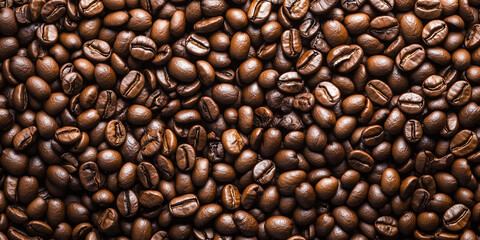 Fototapeta premium Top view of roasted coffee beans. Space for text.