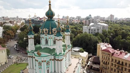 Ukraine, Kyiv's famous St.Andrew Church's drone footage zooming out on a summer day with cloudy skies couple of months before the war.