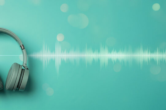 Green color Podcast headphones and waveform blue background, horizontal banner with copy space.