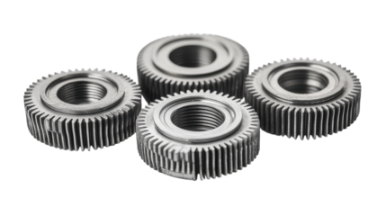 Metal gears arranged artistically on a white background, showcasing intricate designs and textures