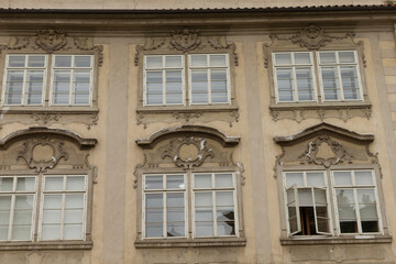 A structure or building that features a large number of windows adorning its exterior, creating an impressive visual impact