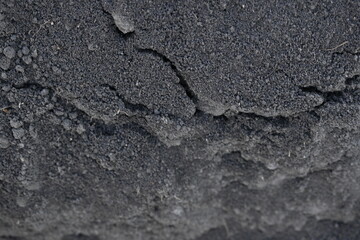 Close up black earth texture, black earth texture, macro texture of earth as background 