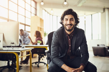 Smile, confidence and portrait of man in modern office, creative tech business project and entrepreneur at design agency. Confident boss with creativity, ideas and focus, businessman with start up.