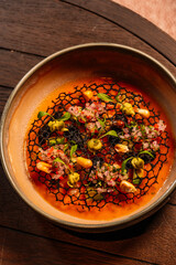 A lattice topping over a soup.