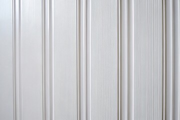 Smooth white plastic wall paneling in extreme close-up