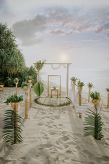 Natural Wedding set up on beach. Beautiful tropical outdoor ceremony or party with ocean view. Eco destination weddings concept
