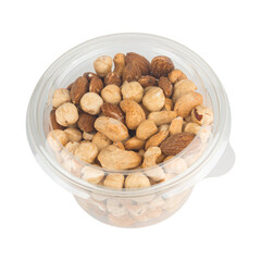 various nuts in a plastic container. Cashew, migdal and hazelnut.    Isolated from background