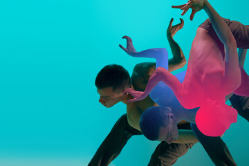 Male dancer captured in mid-movement with abstract overlays of pink and blue shades on aqua background. Concept of modern dance, freestyle, youth, modern art. Contemporary art collage.