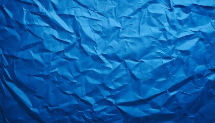 Obraz premium Crumpled blue paper background