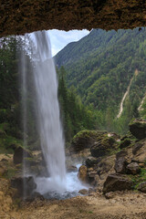 Behind the Peričnik waterfall
