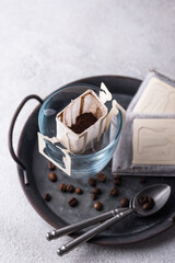 Freshly brewed drip coffee in glass cup