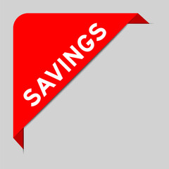 Red color of corner label banner with word savings on gray background
