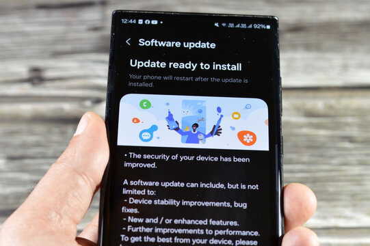 Cairo, Egypt, October 4 2024: Samsung software update for Samsung Flagship cellular phones, Galaxy AI One UI upgrade, with device stability improvements, bug fixes, enhanced features, S23 ultra phone