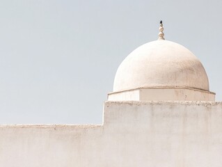 Fototapeta premium A white dome sits atop a building, which is also white. The dome is located on the side of the building, and it is the main focus of the image