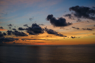 Romantic colorful sunset at the sea. View of Beautiful glorious golden sunset and golden hour above the sea in evening.