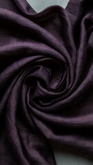 Fototapeta premium Close up view of dark purple linen fabric texture