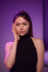 Fototapeta premium An Elegant and Striking Portrait of a Young Woman Radiating Natural Beauty and Graceful Charm
