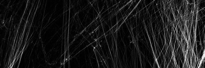 White cobweb on black background, banner design