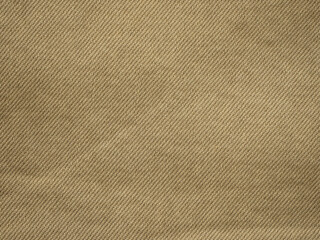 A close-up of textured beige fabric