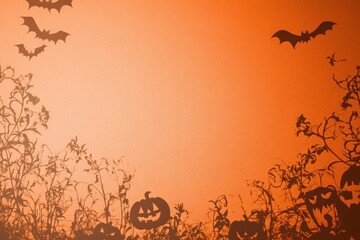 An orange background with silhouettes of a haunted pumpkin, ghosts, and bats floating around. The center remains empty for text, creating a spooky yet minimalistic Halloween scene. 