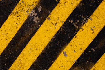 Grunge yellow and black diagonal stripes. Industrial warning background, warn caution,...