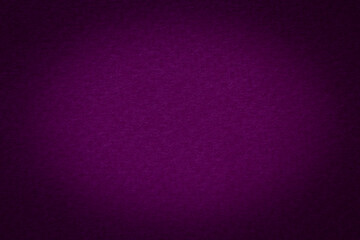 dark purple background: close up of textured cardboard shadowed at edges