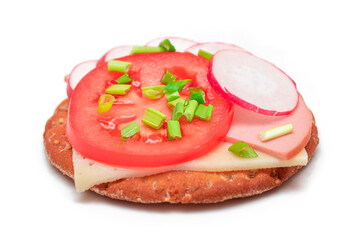Crispy Cracker Sandwich with Tomato, Sausage, Cheese, Green Onions and Radish - Isolated on White. Easy Breakfast. Diet Food. Quick and Healthy Sandwiches. Crispbread with Tasty Filling - Isolation